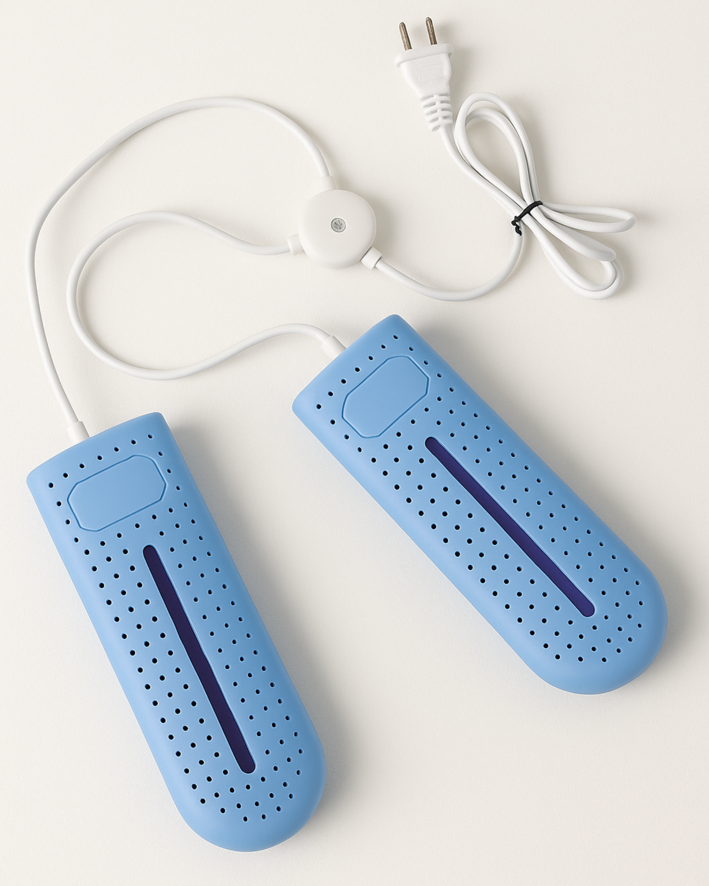 Blue shoe dryer with power cord on a white background