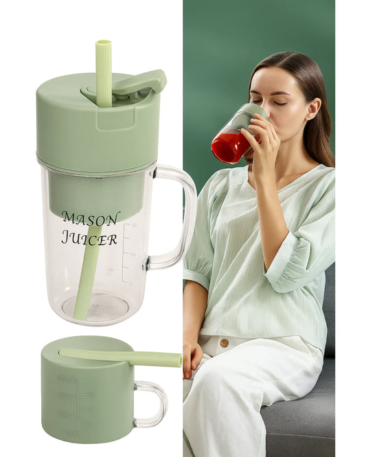Mason Juicer with a green lid and handle, and a person drinking from a red cup.