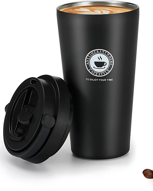 Black insulated tumbler with lid and coffee beans on a white background