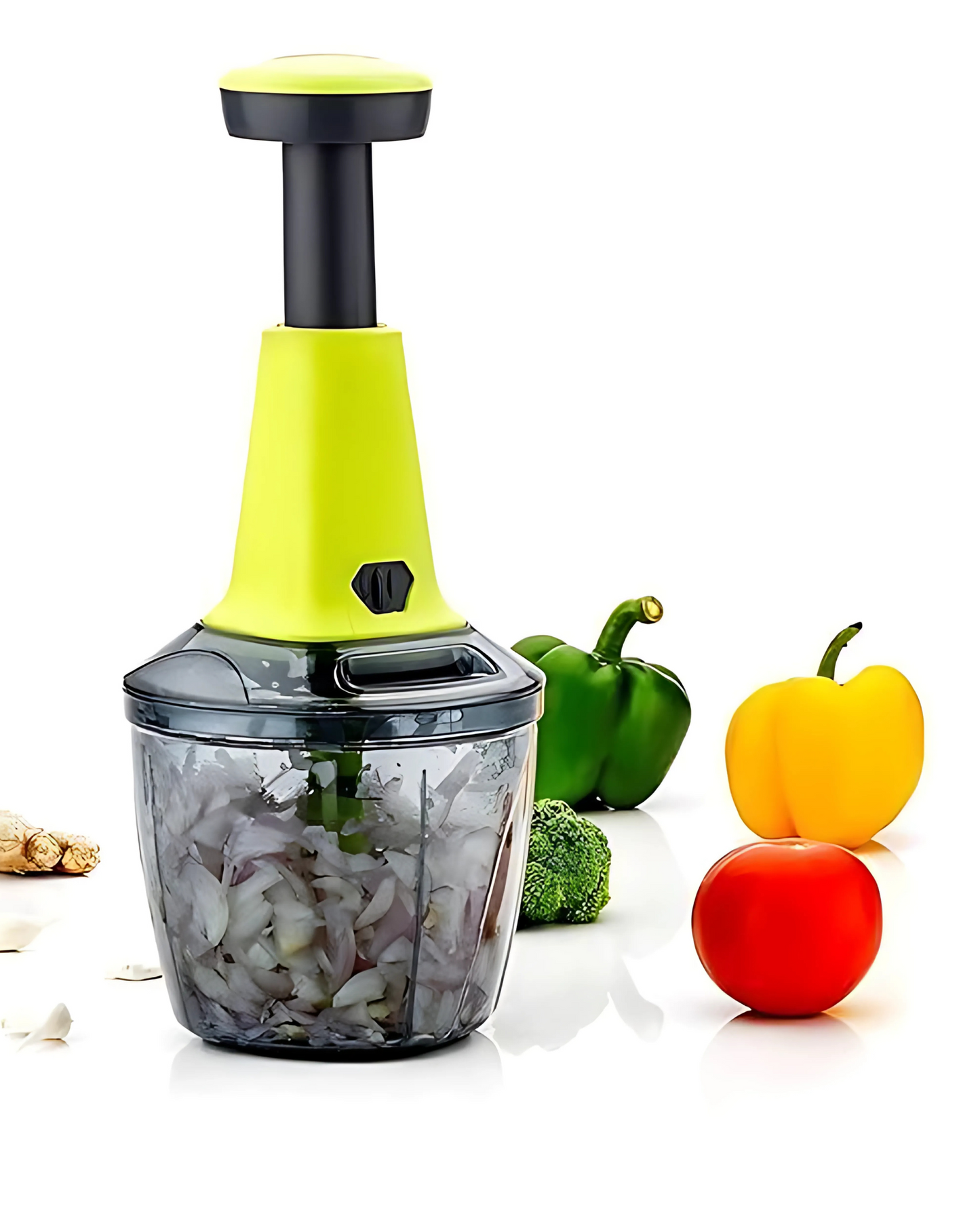 Vegetable chopper with chopped vegetables and whole vegetables on a white background