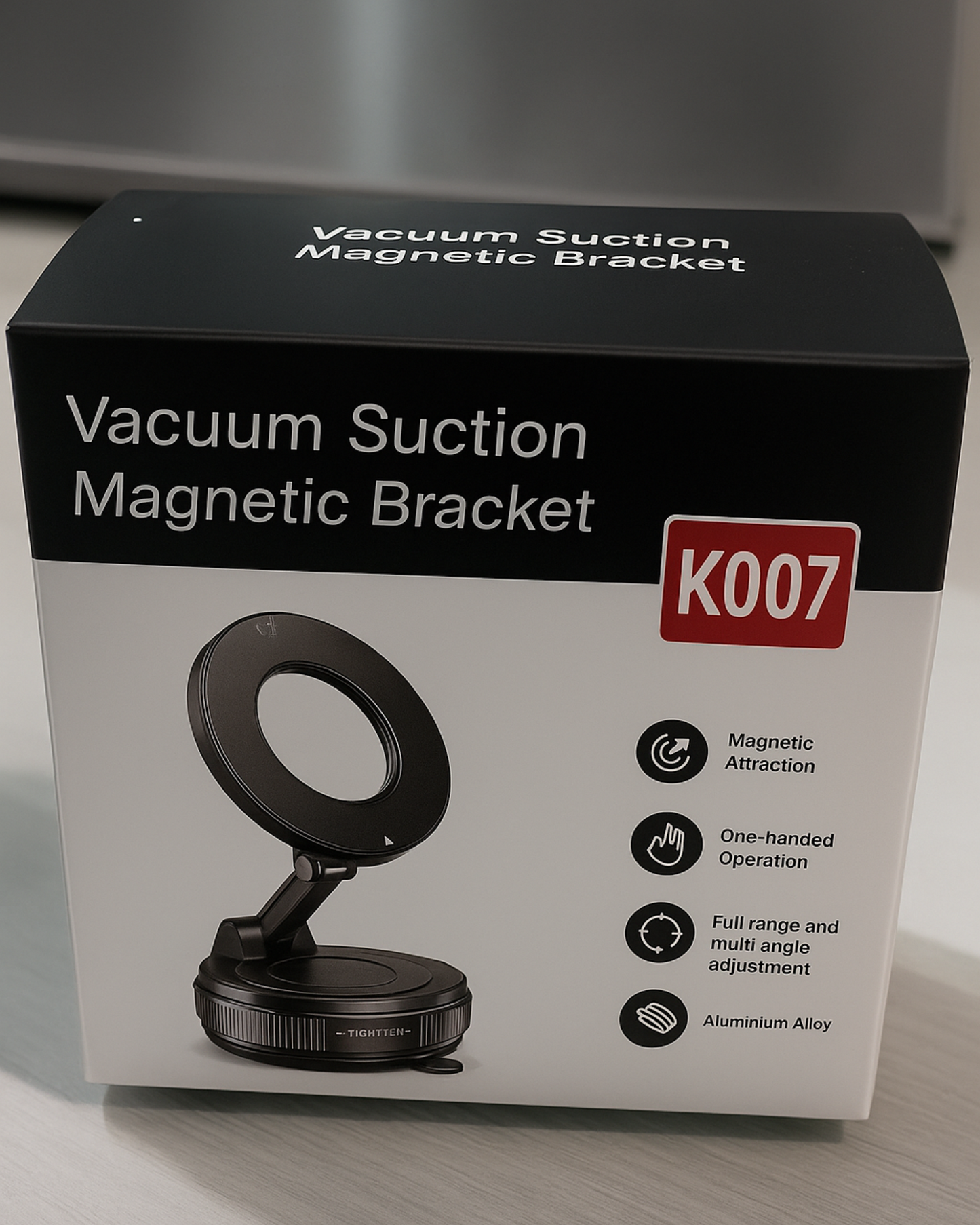 Box of a vacuum suction magnetic bracket with branding and product features.