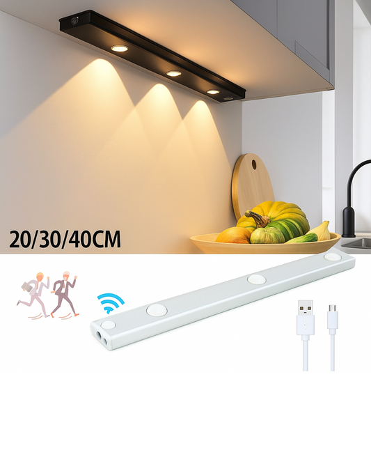 Cooking area with a strip light above and USB cable beside it.
