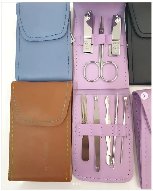 Manicure set with tools in a purple case with a blue, brown, and black background.