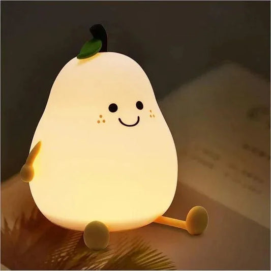 Cute pear-shaped night light with a smiling face on a dark background
