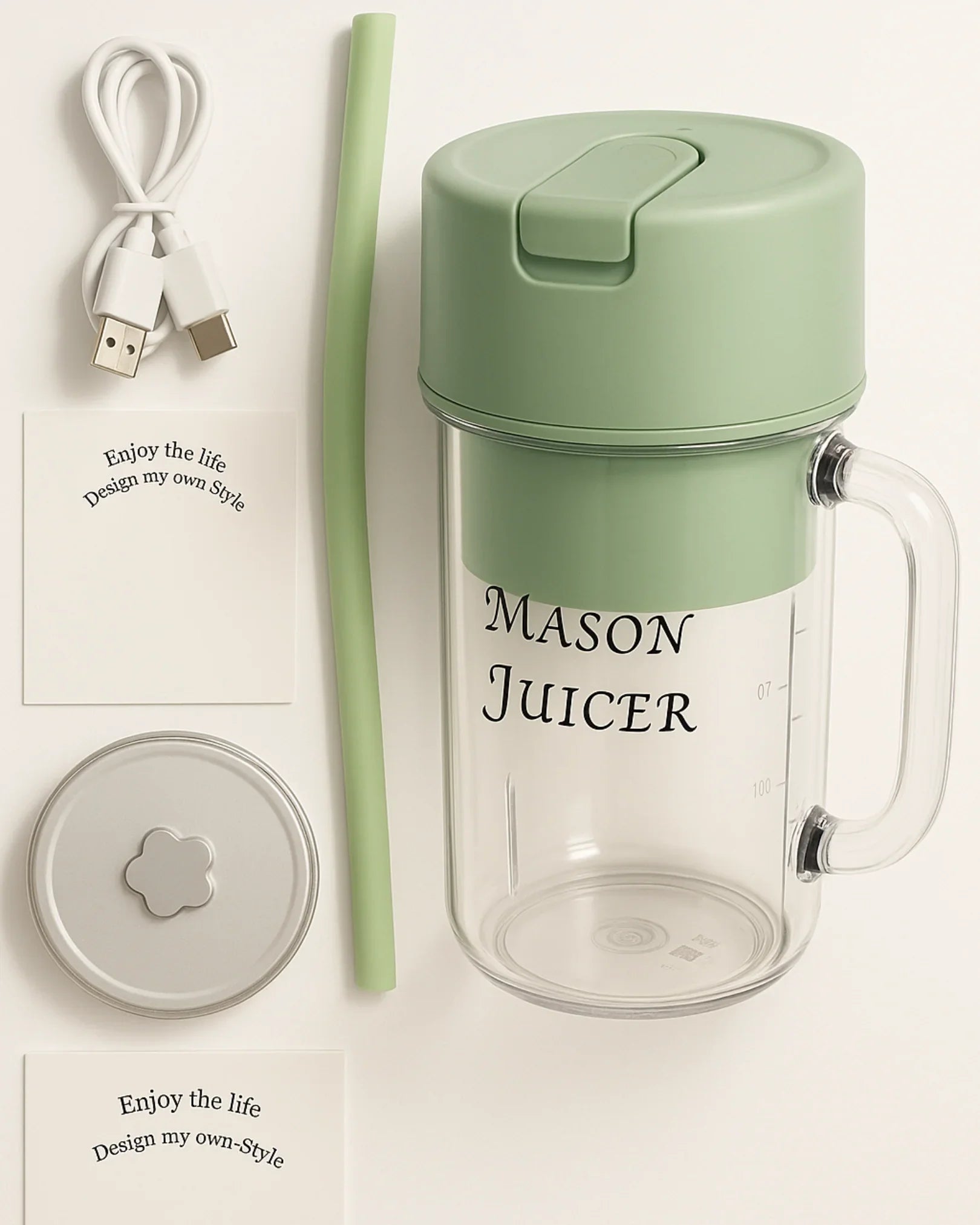Mason Juicer with green lid and straw on a white background