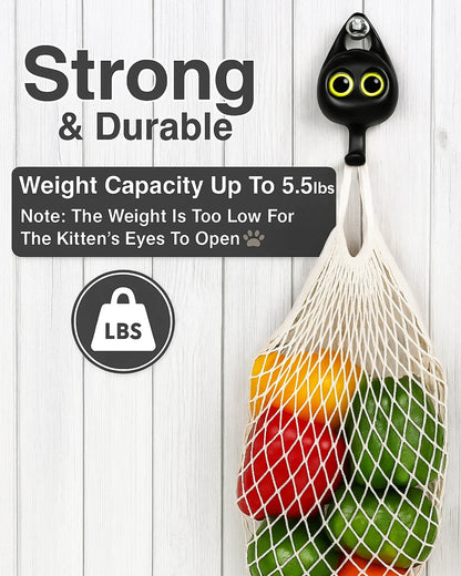 Cat toy with a net bag filled with colorful toys on a wooden background