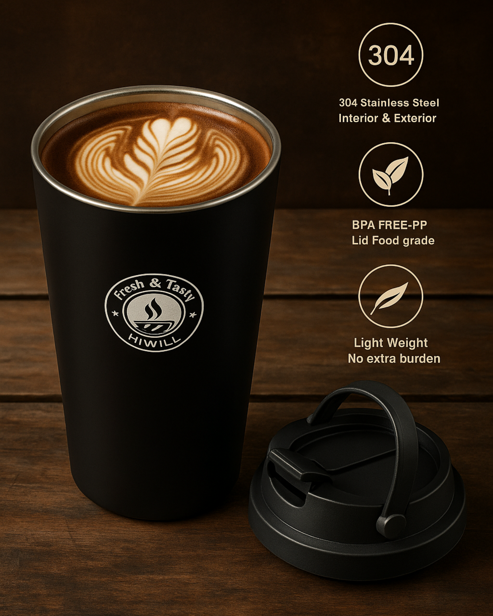 Black coffee tumbler with latte art on a wooden surface