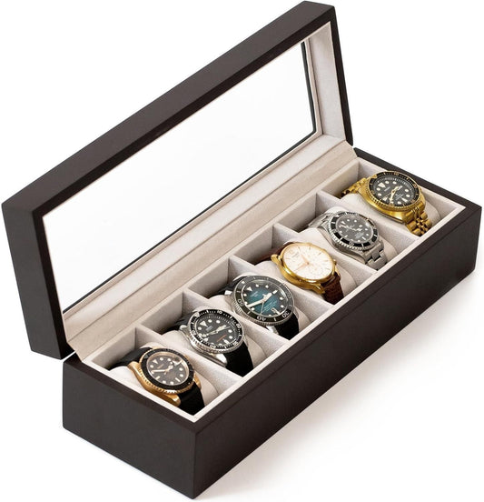 Black watch box with six compartments holding six watches on a white background