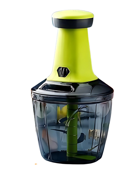 A multicolored (green and black) manual push food chopper with a transparent container and steel blade visible inside.