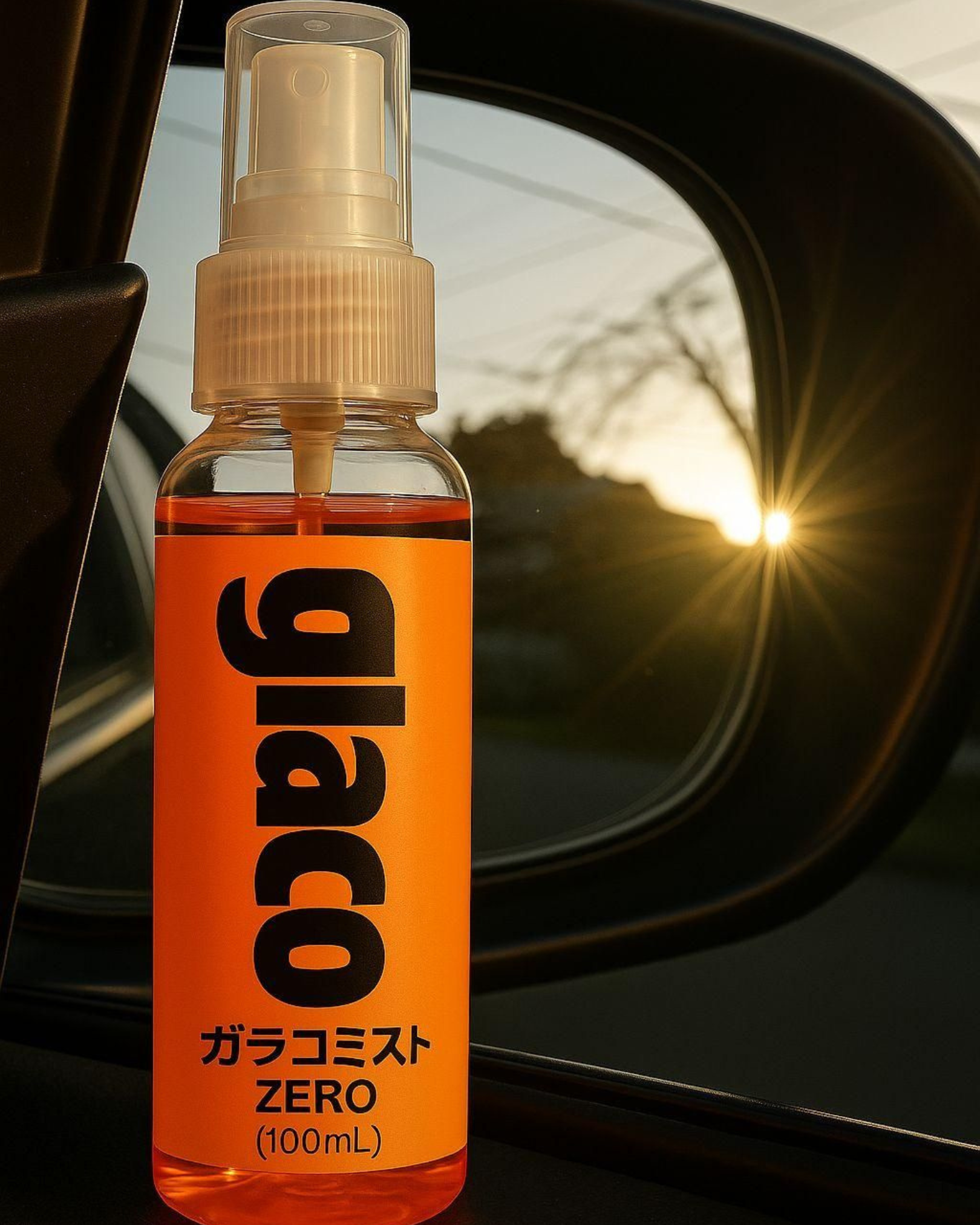 Orange spray bottle labeled 'glaco' with a blurred background