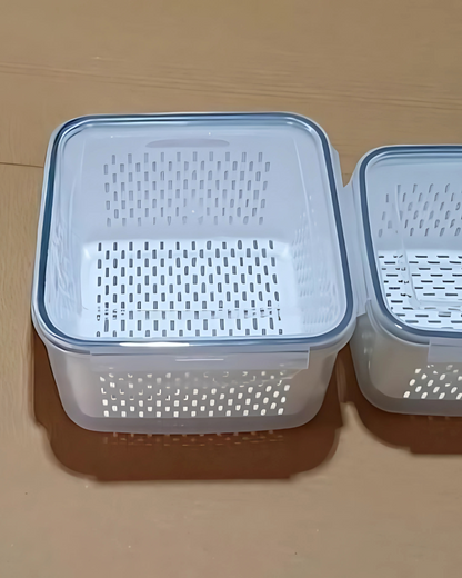 Two plastic containers with perforated lids on a beige surface
