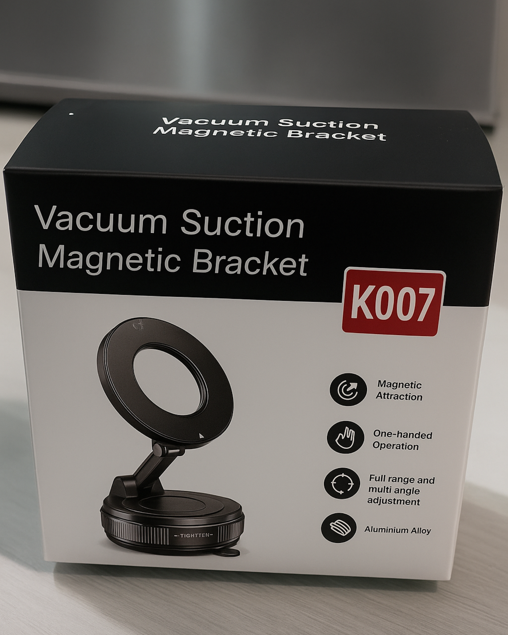 Box of a vacuum suction magnetic bracket with branding and product features.