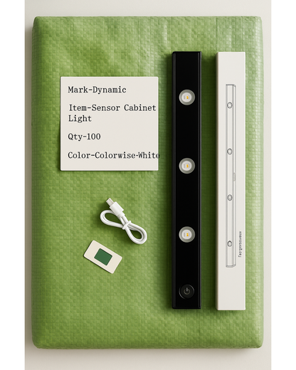 Sensor cabinet light with packaging on a green surface