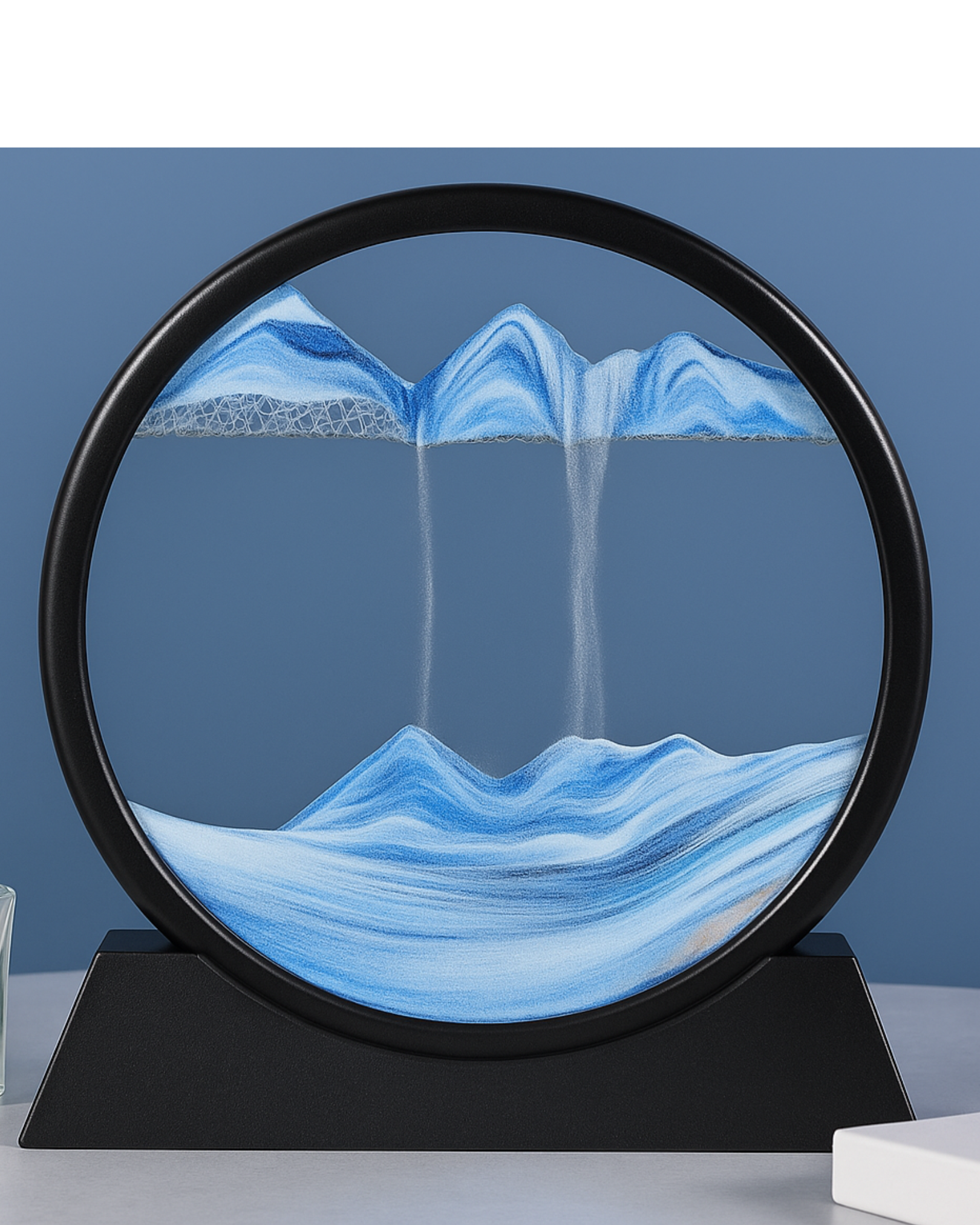 Sculptural piece with blue and white流动material on a dark base.