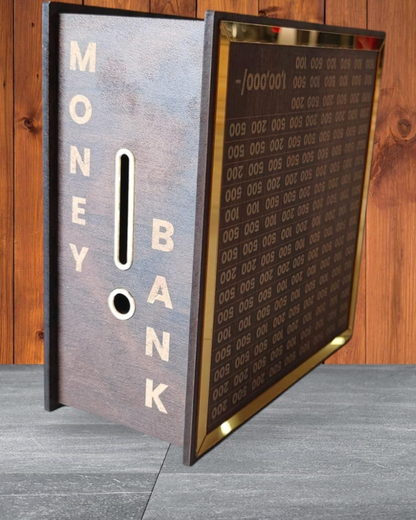 Money box with 'Money Bank' text and digital display against a wooden background.