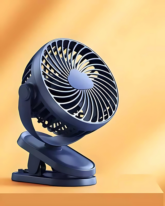 A blue USB portable desktop fan with a clip base, shown in an upright position against an orange background.