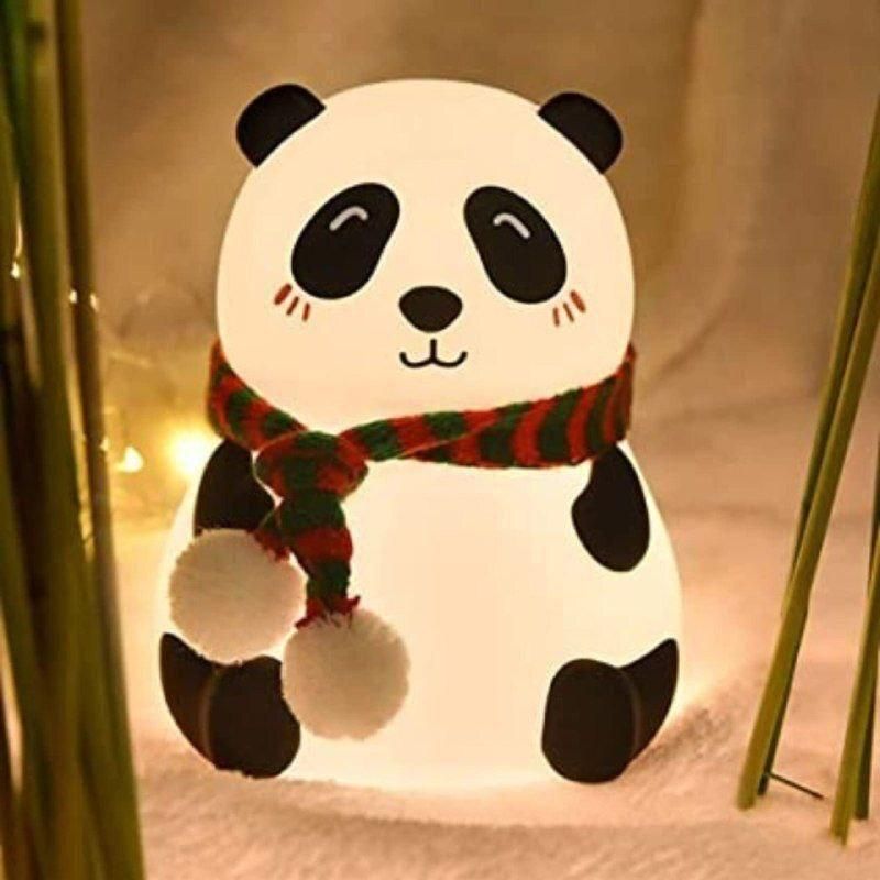 Panda-shaped night light with a scarf on a neutral background
