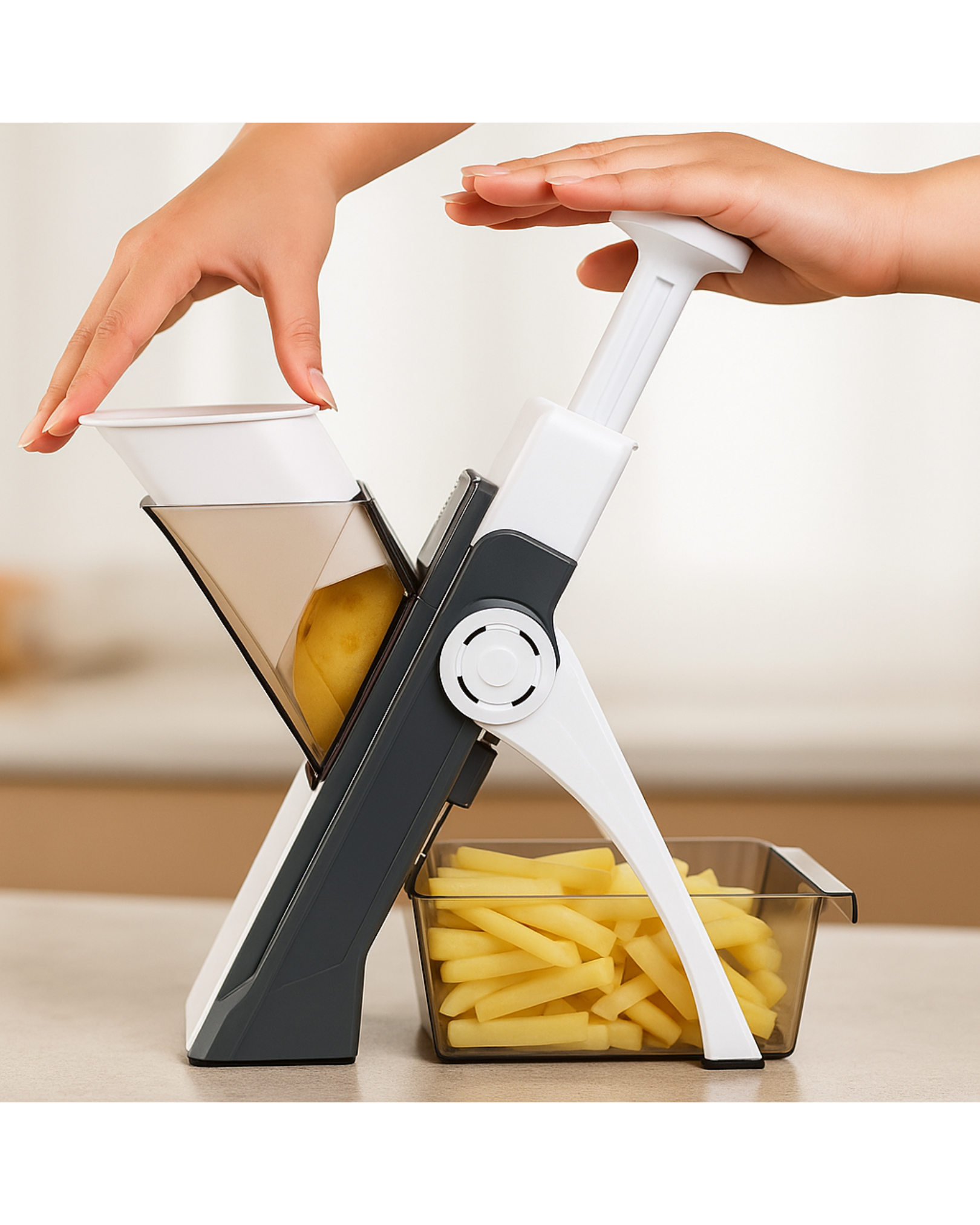 Handheld vegetable chopper with a clear container holding sliced potatoes.